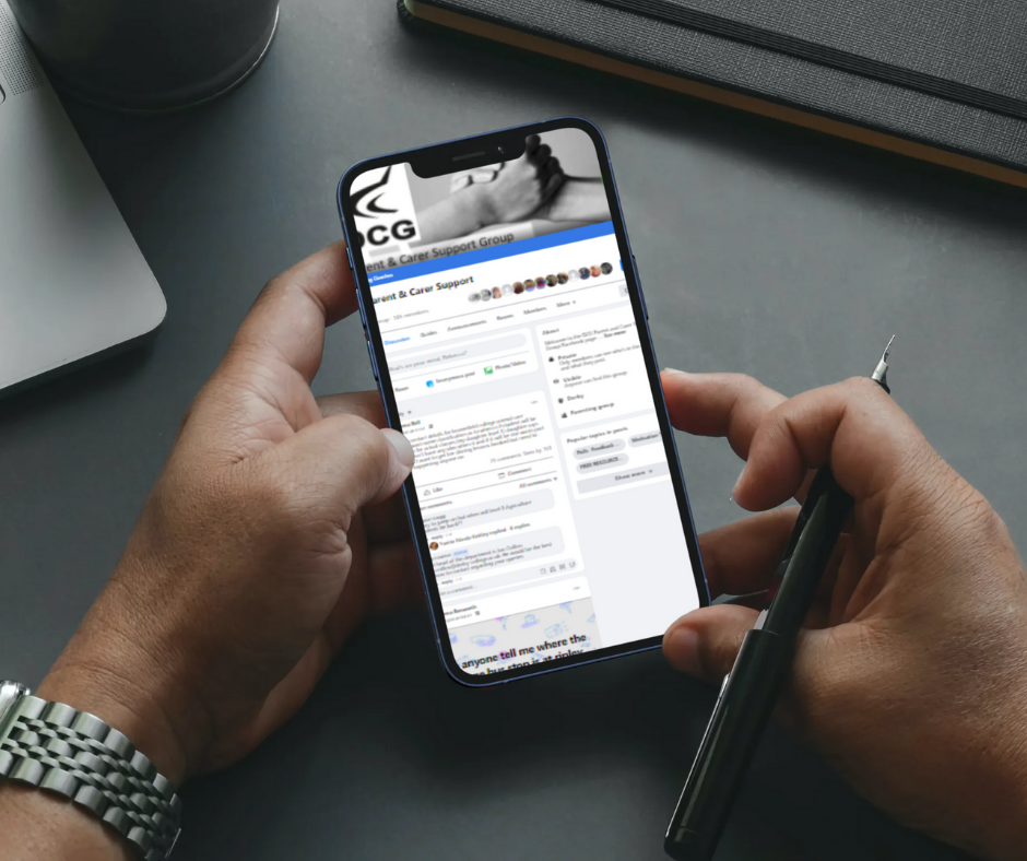 Hands holding mobile phone